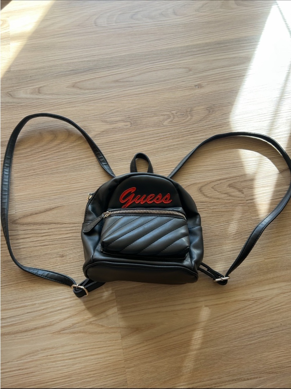Guess Black Mini Quilted Backpack with Gold Accent Logo